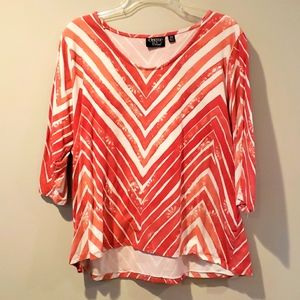 Sparkly deep coral shirt.